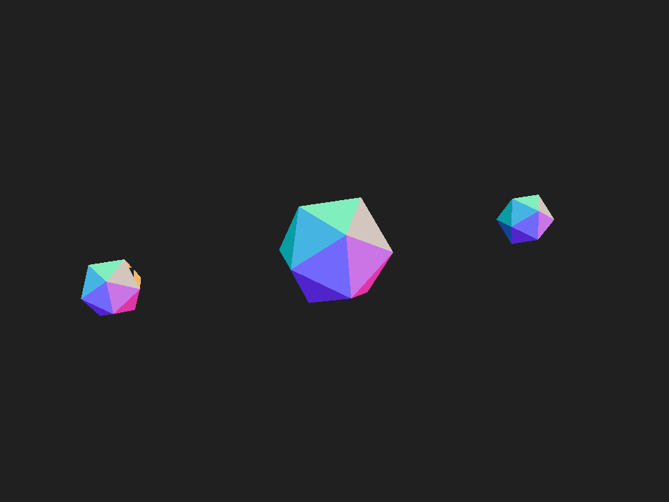 The icosahedra rendered in vivid rainbow colors where each facet's hue encodes its surface-normal direction.