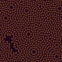Isolated orange spots on a dark field.